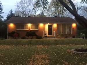 house with recessed soffit lights
